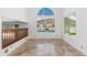 Bright living room with a grand window showcasing serene lake views at 5510 W Arrowhead Lakes Dr, Glendale, AZ 85308