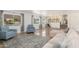 Open living area with lake views, stairs, and an inviting atmosphere at 5510 W Arrowhead Lakes Dr, Glendale, AZ 85308