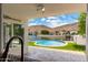 Window view showcasing the pool, backyard, and lake at 5510 W Arrowhead Lakes Dr, Glendale, AZ 85308