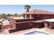 Backyard featuring a empty pool, gravel landscape, and home at 5716 E Desert Vista Trl, Cave Creek, AZ 85331