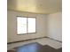 An empty room featuring a window allowing for natural light and scenic views at 5716 E Desert Vista Trl, Cave Creek, AZ 85331