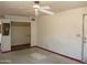 Bedroom featuring an open closet and ceiling fan, ready for remodel at 5716 E Desert Vista Trl, Cave Creek, AZ 85331