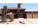 Two-story home featuring a Spanish tile roof, stucco exterior, and a well-manicured yard at 5716 E Desert Vista Trl, Cave Creek, AZ 85331