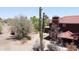 Two-story home featuring a Spanish tile roof, stucco exterior, and desert landscaping at 5716 E Desert Vista Trl, Cave Creek, AZ 85331