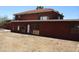 Rear exterior view of home showing areas that need repair work at 5716 E Desert Vista Trl, Cave Creek, AZ 85331