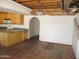 Kitchen with tile flooring, island, and wood cabinets at 5716 E Desert Vista Trl, Cave Creek, AZ 85331