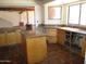 Kitchen features tile flooring, wood cabinets, and plenty of countertop space at 5716 E Desert Vista Trl, Cave Creek, AZ 85331
