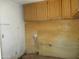 Unfinished laundry area shows connections and cabinets above awaiting appliances at 5716 E Desert Vista Trl, Cave Creek, AZ 85331