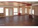 Open living area with tile flooring, bright windows, and exposed column at 5716 E Desert Vista Trl, Cave Creek, AZ 85331