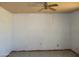 Spacious living room featuring tile flooring and ceiling fan for comfortable living at 5716 E Desert Vista Trl, Cave Creek, AZ 85331