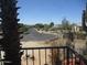 View of the neighborhood street from a balcony in disrepair at 5716 E Desert Vista Trl, Cave Creek, AZ 85331