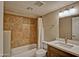 The bathroom has a shower-tub combo with tile surround and a vanity with modern fixtures at 602 N May -- # 17, Mesa, AZ 85201