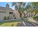 Attractive property showcasing manicured lawn, mature trees, and a classic stucco design at 602 N May -- # 17, Mesa, AZ 85201