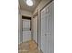 Convenient laundry area features a stacked washer and dryer and extra storage at 602 N May -- # 17, Mesa, AZ 85201
