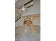 Bright, open living space featuring high ceilings, ceiling fans, and a view of the kitchen area at 602 N May -- # 17, Mesa, AZ 85201