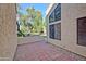 Inviting outdoor patio with brick pavers, ideal for relaxation and entertaining at 602 N May -- # 17, Mesa, AZ 85201