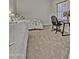Inviting bedroom with twin beds, neutral carpet, and a sunny window perfect for relaxing and studying at 602 N May -- # 23, Mesa, AZ 85201