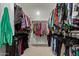 Walk-in closet featuring ample hanging space for both short and long garments at 6931 W Spur Dr, Peoria, AZ 85383