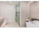 Elegant bathroom features a soaking tub, glass shower, and modern fixtures at 7137 E Rancho Vista Dr # 4011, Scottsdale, AZ 85251
