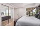 Contemporary bedroom with sliding mirrored closet doors and a city view at 7137 E Rancho Vista Dr # 4011, Scottsdale, AZ 85251