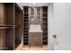Spacious walk-in closet offering custom shelving and ample storage space at 7137 E Rancho Vista Dr # 4011, Scottsdale, AZ 85251