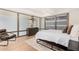 Modern bedroom with a minimalist style featuring a dark wood cabinet at 7137 E Rancho Vista Dr # 4011, Scottsdale, AZ 85251