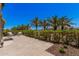 Peaceful patio featuring comfortable chairs, lush greenery, and a clear blue sky backdrop at 7137 E Rancho Vista Dr # 4011, Scottsdale, AZ 85251