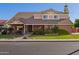 Charming two-story home with a well-manicured lawn and a welcoming front entrance. Includes a beautiful tile roof at 736 S Winthrop Cir, Mesa, AZ 85204