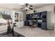 Home office featuring a ceiling fan, and large built in desk at 736 S Winthrop Cir, Mesa, AZ 85204