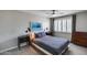 Stylish bedroom with a comfortable bed, modern decor, and ample natural light from shuttered windows at 7808 E Valley Vista Dr, Scottsdale, AZ 85250
