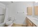 Bright bathroom with tile flooring featuring a shower/tub, toilet and vanity at 8318 E Via De Los Libros --, Scottsdale, AZ 85258