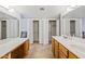 Large bathroom features double sinks, wood cabinetry, and plenty of closet storage at 8318 E Via De Los Libros --, Scottsdale, AZ 85258