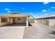 Attached two-car carport featuring desert landscaping and a wooden fence, offering privacy and functionality at 8318 E Via De Los Libros --, Scottsdale, AZ 85258