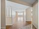 Open-concept living room with hardwood floors, natural light, and a seamless flow into other living spaces at 8318 E Via De Los Libros --, Scottsdale, AZ 85258