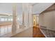 The living room with columns offering a view to the adjacent rooms and natural light at 8318 E Via De Los Libros --, Scottsdale, AZ 85258