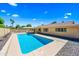 Backyard oasis featuring a sparkling pool, complemented by lush landscaping and a well-maintained patio for outdoor enjoyment at 8318 E Via De Los Libros --, Scottsdale, AZ 85258