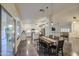 Open dining area with access to kitchen and living room perfect for entertaining at 8748 W Maui Ln, Peoria, AZ 85381
