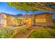 Beautiful single-Gathering home showcasing a landscaped yard and an attached two-car garage at 8748 W Maui Ln, Peoria, AZ 85381