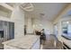 View of the kitchen, dining area, and backyard at 8748 W Maui Ln, Peoria, AZ 85381