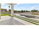 Backyard with a pool under construction and a large, well-maintained grass area at 9611 E Clinton St, Scottsdale, AZ 85260