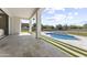 Beautiful backyard patio featuring a modern outdoor living space with a pool and manicured landscaping at 9611 E Clinton St, Scottsdale, AZ 85260