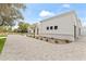 Well-maintained home featuring a spacious driveway and landscaped front yard at 9611 E Clinton St, Scottsdale, AZ 85260