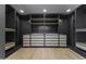 Organized walk-in closet featuring drawers and shelving at 9611 E Clinton St, Scottsdale, AZ 85260