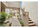 Beautiful courtyard with mature landscaping, fountain, and stucco architecture at 10015 E Mountain View Rd # 2034, Scottsdale, AZ 85258