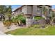 Charming condo with lush landscaping, desert plants and mature palm trees at The Fountains community entrance at 10015 E Mountain View Rd # 2034, Scottsdale, AZ 85258