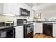 Modern kitchen showcasing sleek appliances, white cabinets, and granite countertops at 10015 E Mountain View Rd # 2034, Scottsdale, AZ 85258