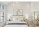 Airy bedroom with vaulted ceiling, chandelier, and ample natural light at 10015 E Mountain View Rd # 2034, Scottsdale, AZ 85258