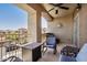 Relax on this spacious balcony with a seating area and scenic views at 10136 E Southern Ave # 3091, Mesa, AZ 85209