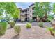 Well-maintained building exterior showcasing lush landscaping, providing a welcoming and tranquil environment at 10136 E Southern Ave # 3091, Mesa, AZ 85209