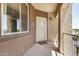 Inviting covered front porch with security door, natural light and unit number 1091 at 10136 E Southern Ave # 3091, Mesa, AZ 85209